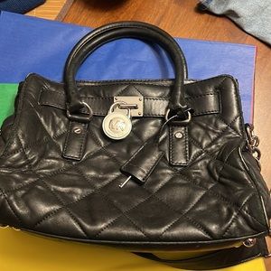 Michael Kors black satchel with bag charm